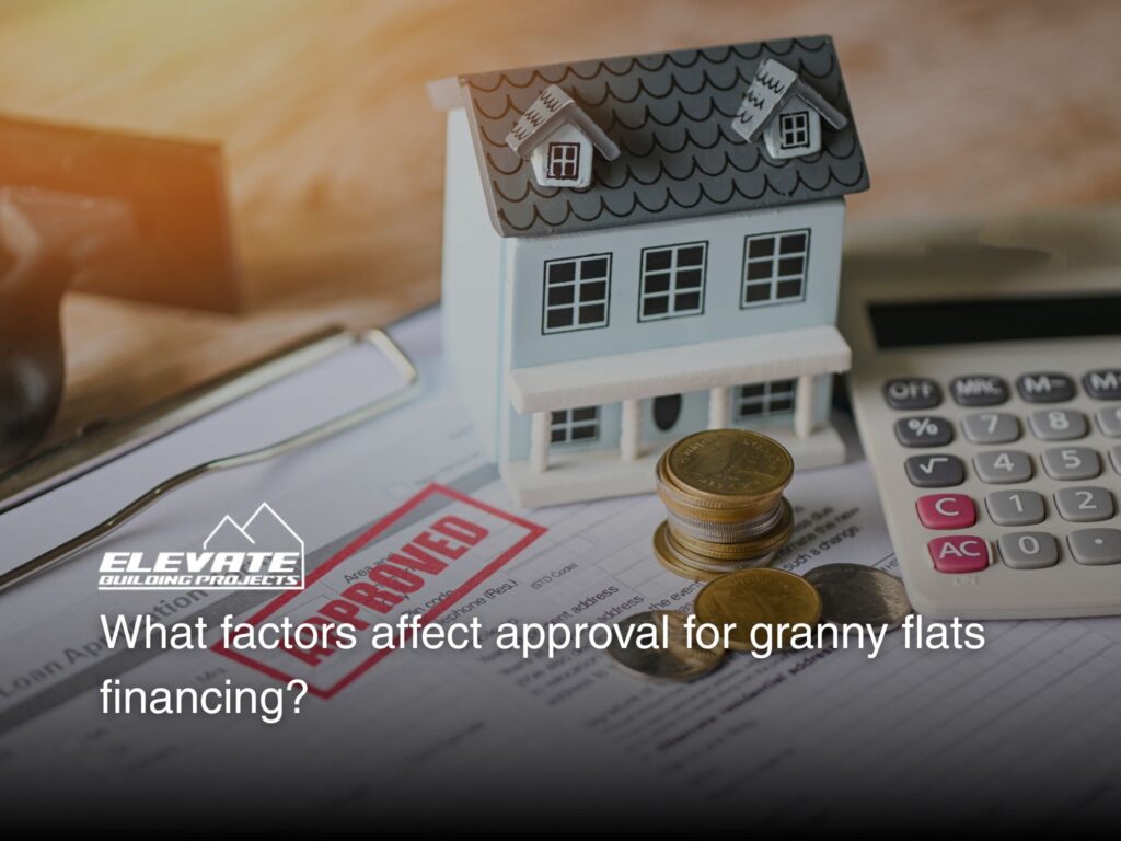 A miniature house, calculator, and a stack of coins on top of an approved loan application form.